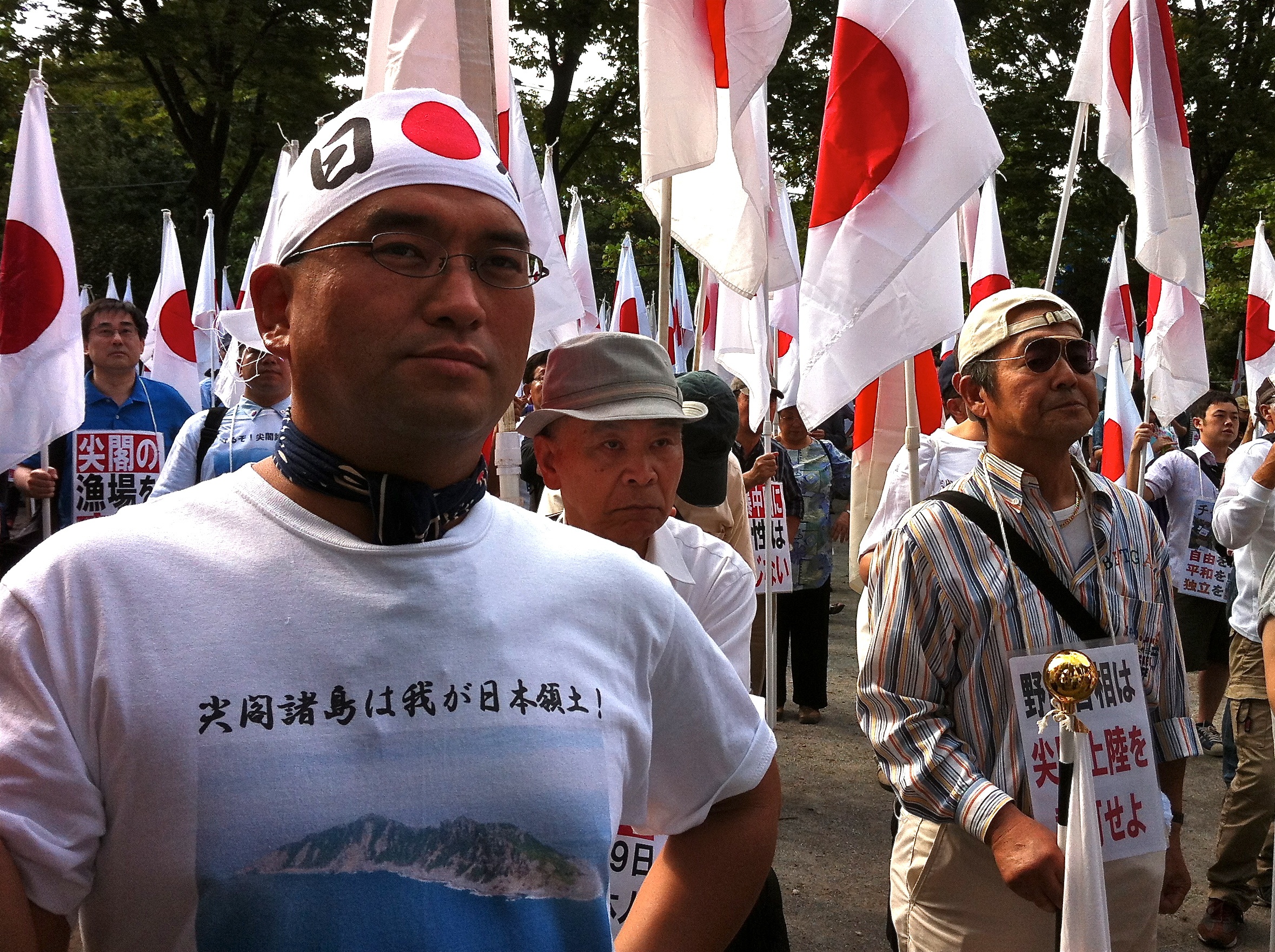 Featured image: A demonstrator bares a shirt declaring the Senkaku/Diaoyu islands as Japanese territory. Nationalist group 'Ganbare Nippon' has seized on the issue as an example that Japan needs to enact a tougher foreign policy position towards China and its recent 'aggression'.