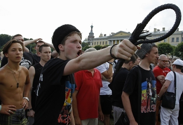 Anti-gay rioters in Russia. Image by OLGA MALTSEVA / Getty Images