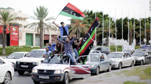 Libya's Rebels celebrate in Tripoli after the death of Muammar Gaddafi. Image Source: http://cnn.it/1FPmlqy