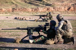 British Military Advisors work with Kurdish Peshmerga forces. Image Source: http://dailym.ai/1GLBuXu